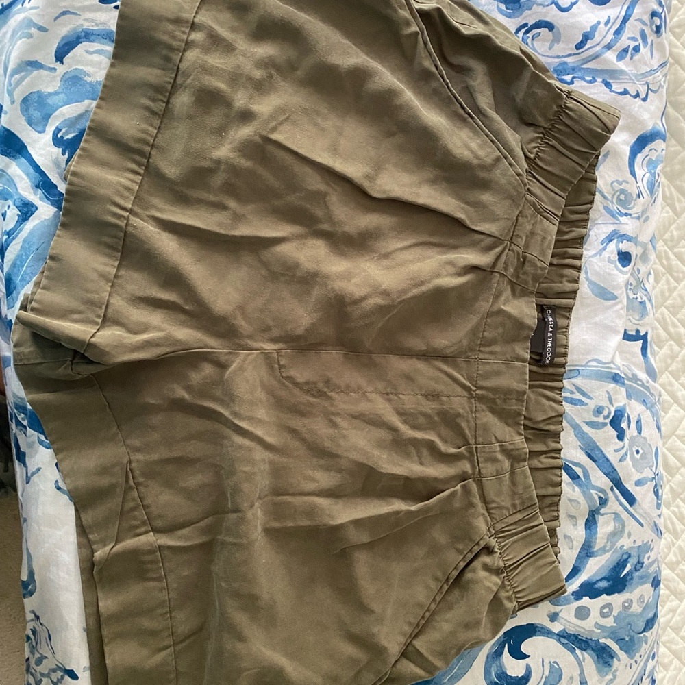 Chelsea and Theodore high waisted olive green shorts